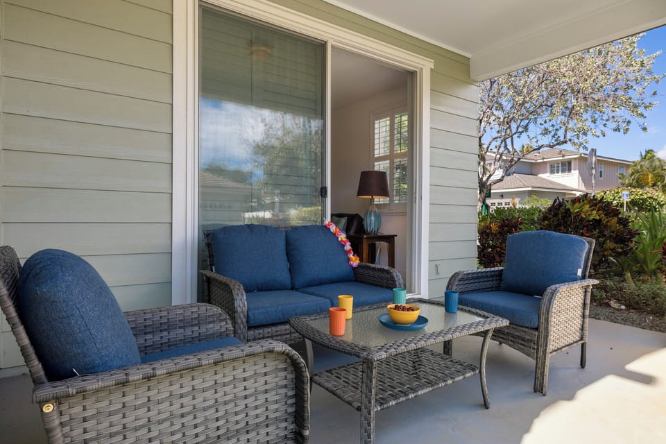 Enjoy morning coffee or evening relaxation on the private covered lanai surrounded by lush tropical greenery.