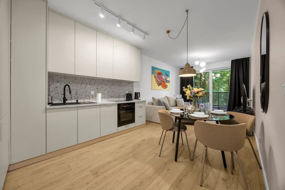 Modern Kitchenette with Dining Area & Premium Appliances | Book Now with RENTUJEMY.COM