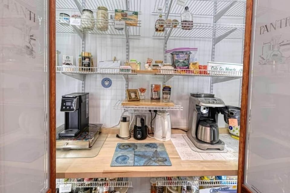 The well-stocked pantry offers a wide array of condiments, staples, and spices, plus specialty teas for tea lovers. Coffee enthusiasts will be thrilled with five distinct coffee makers. Luxury at its finest.