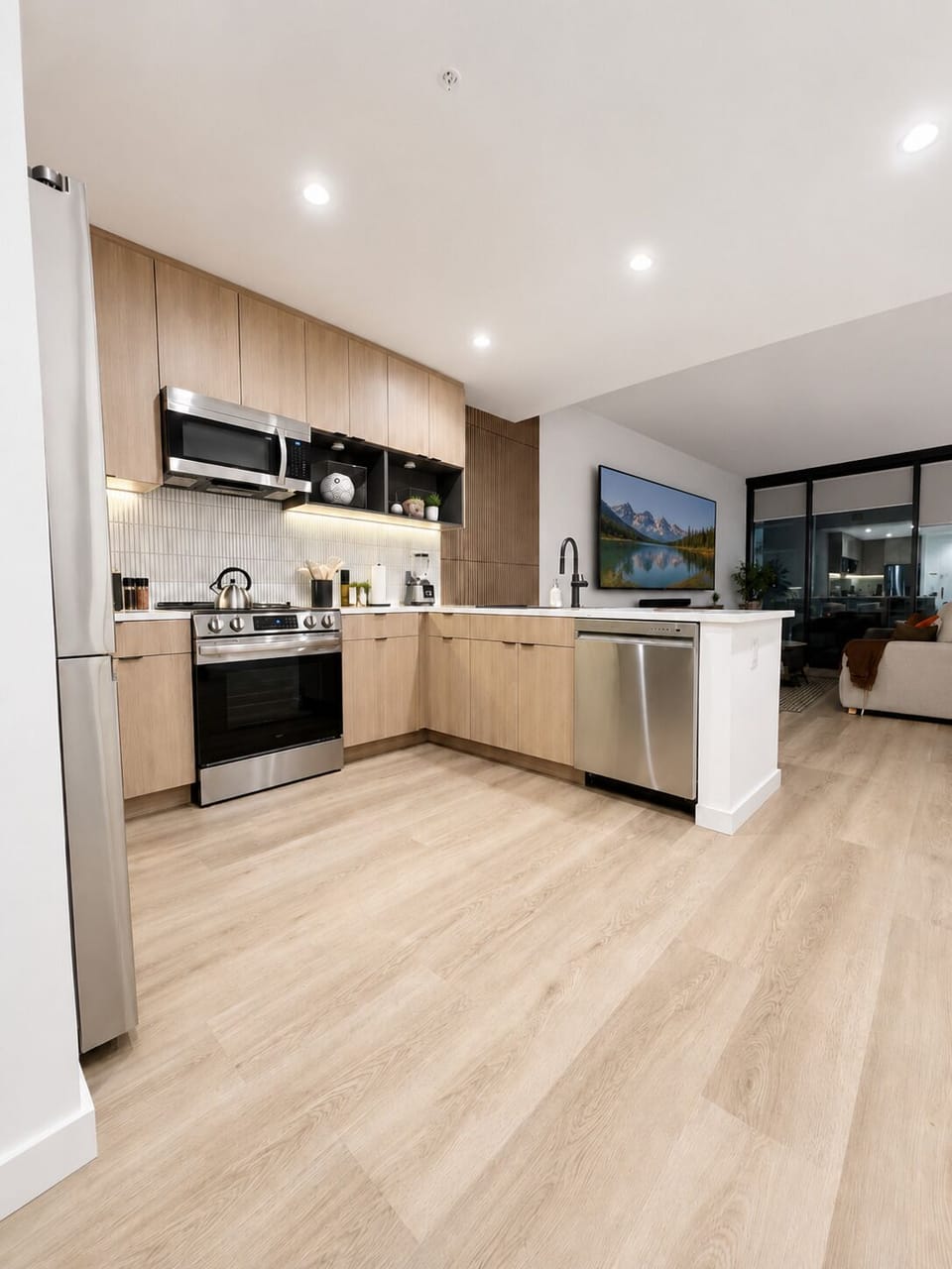 Cook, dine, and gather in this modern chef-inspired kitchen featuring stainless steel appliances, quartz countertops, custom cabinetry, and a spacious island. Fully equipped with everything you need for a comfortable stay in downtown Atlanta.
