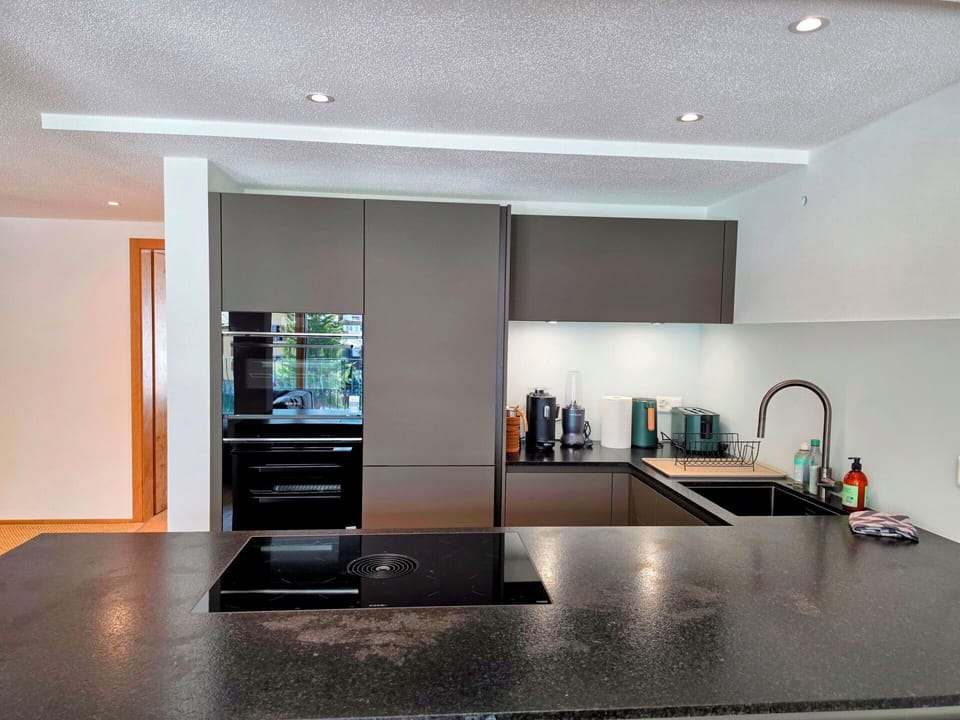 Kitchen, Countertop, Kitchen Appliance, Interior Design, Cabinetry, Flooring, Major Appliance, Wood, Furniture, Ceiling