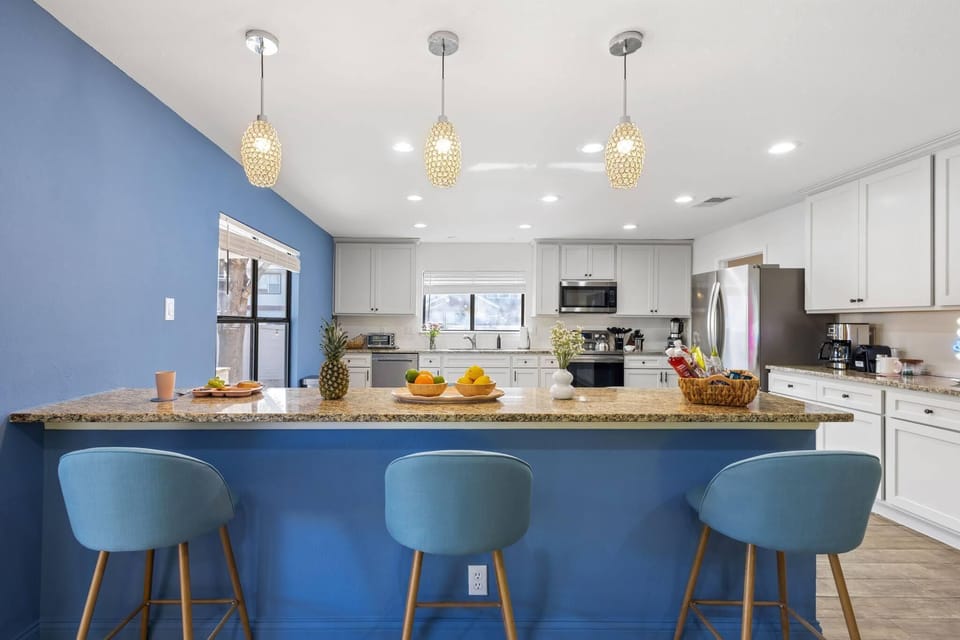 A spacious kitchen complete with your cooking essentials (blender, toaster, pots, pans, etc.)