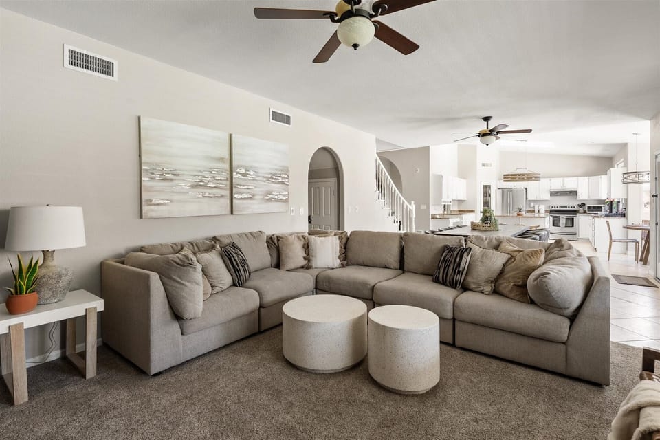 Spacious family room with comfortable seating for relaxing after a day in Scottsdale.