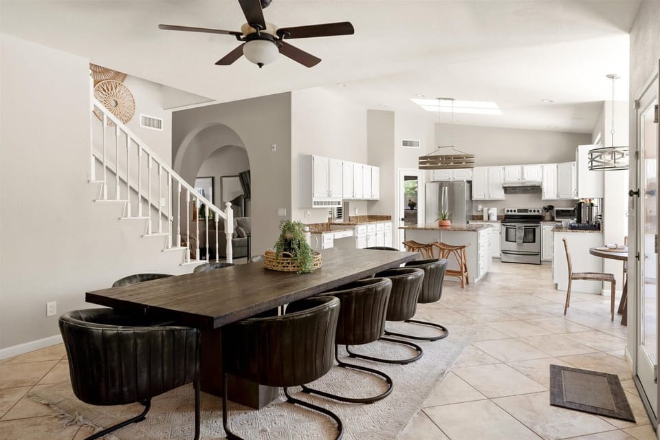 Open dining space designed for family dinners, group meals, and relaxed evenings at home.  Seating for 10.