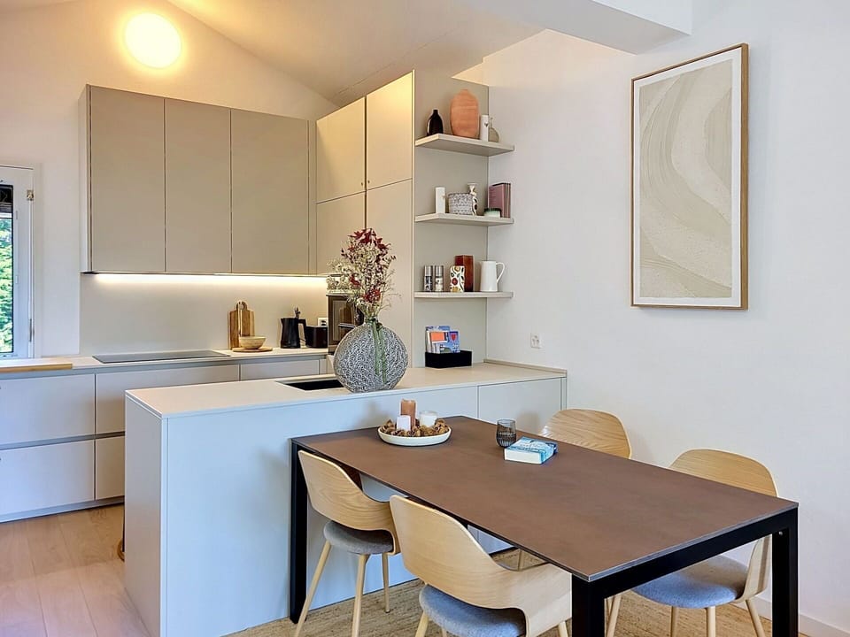 Furniture, Interior Design, Kitchen, Countertop, Flooring, Cabinetry, Floor, Kitchen Appliance, Wall, Wood