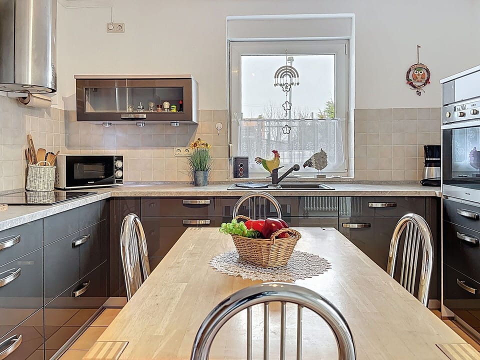 Furniture, Kitchen, Countertop, Kitchen Appliance, Cabinetry, Interior Design, Flooring, Wood, Light Fixture, Home