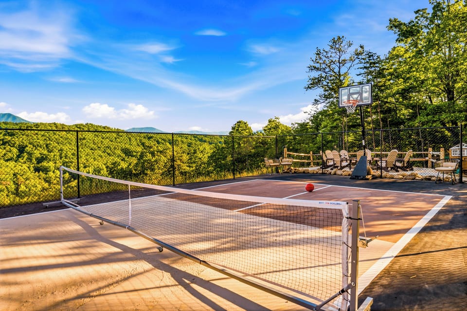 Private pickleball court with basketball hoop and stunning mountain views