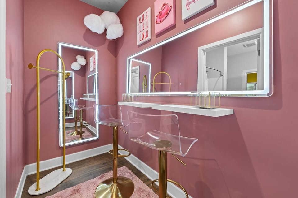 - Glam-ready vanity room with LED mirrors and seating 
- Pink décor and chic accents elevate your vacation prep 
- Ideal beauty lounge for getting ready with friends 
