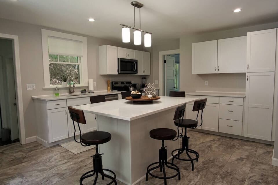 Bright, fully equipped and easy to clean. Plenty of space for your food storage and for serving.