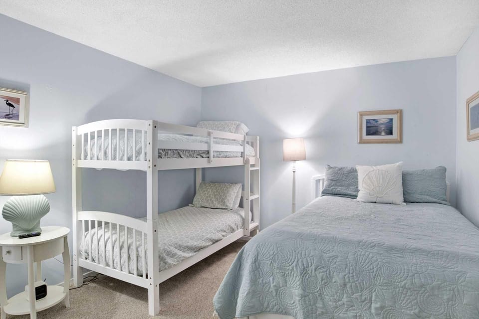 Cozy bedroom with bunk beds and soft ambient lighting