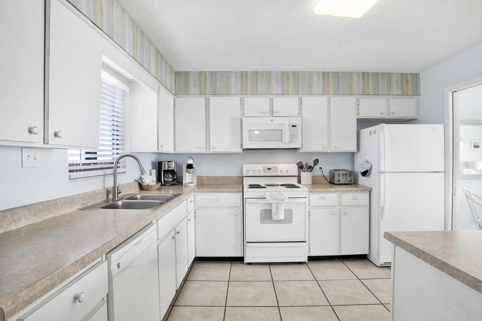 Bright, airy kitchen with ample counter space and modern appliances