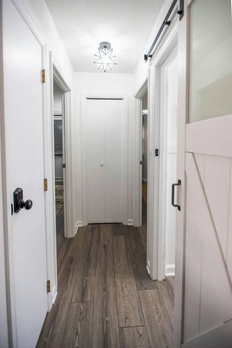 Hallway leading to bedrooms & bathroom