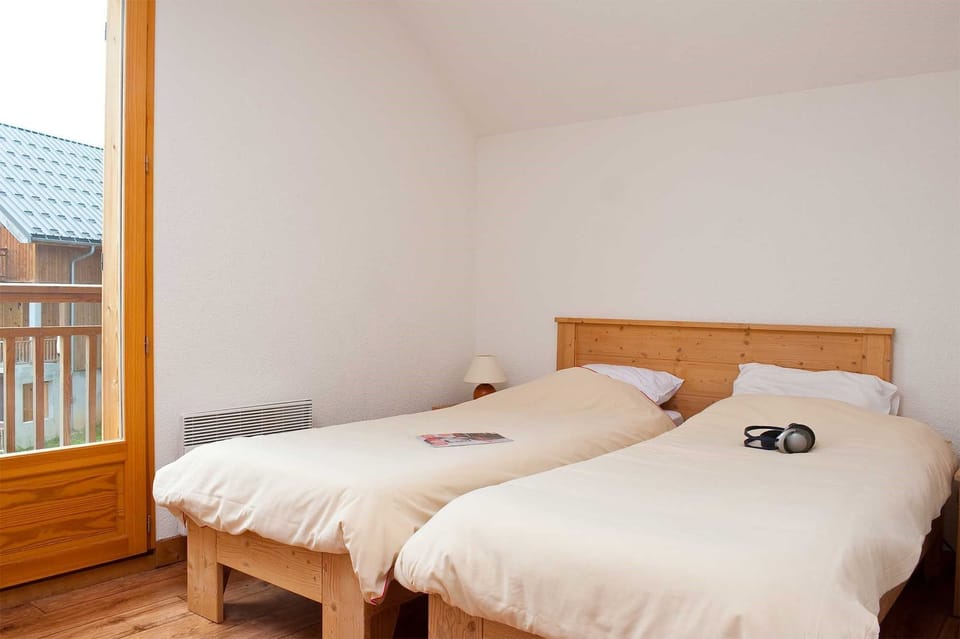 Drift to sleep in a comfortable bed after a wonderful day outside. Bedding configurations vary.