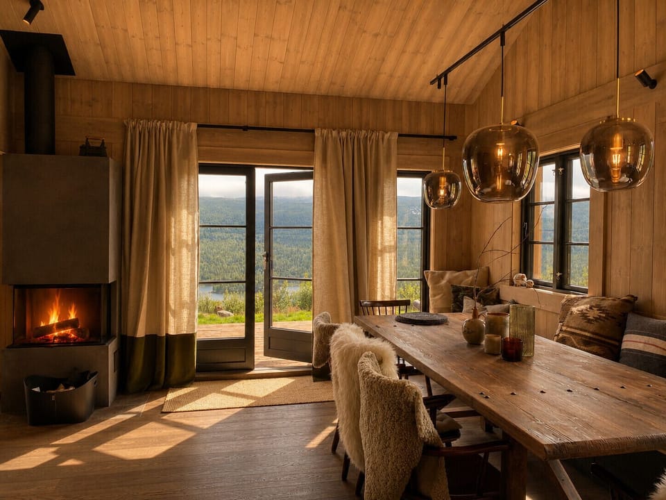 Comfortable dining space next to the kitchen for easy serving with natural light and seating for the whole family