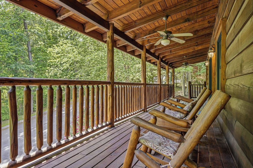 Deck rocking chairs overlooking the peaceful wooded setting