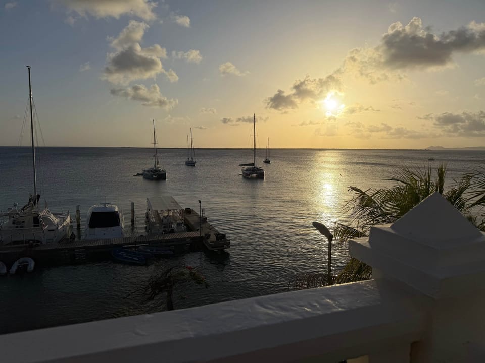 Never a dull moment with passing boats, sunset and glistering waters.