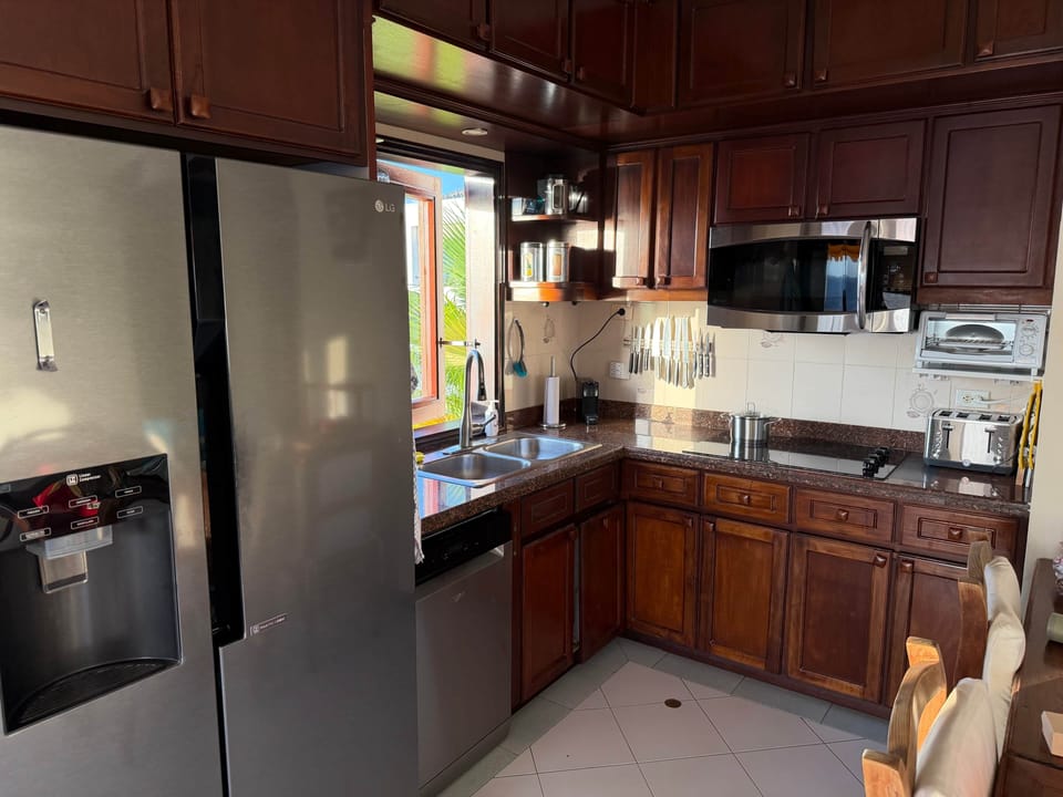 Cook with ocean views and enjoy a warm, fully equipped kitchen made for short and long stays.