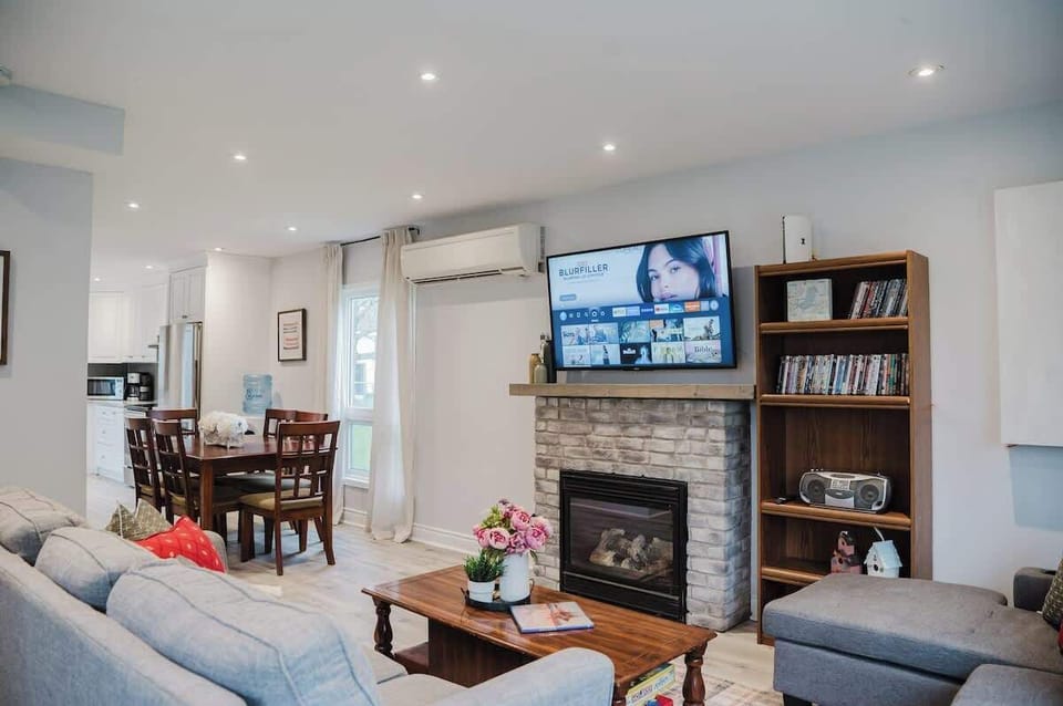 Cozy living room with so much space for the whole family to relax and watch a movie or play a board game.
