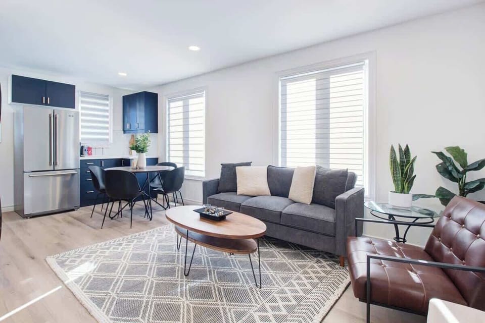 Relax and recharge in this bright, airy living space perfect for morning coffee or evening conversations.
