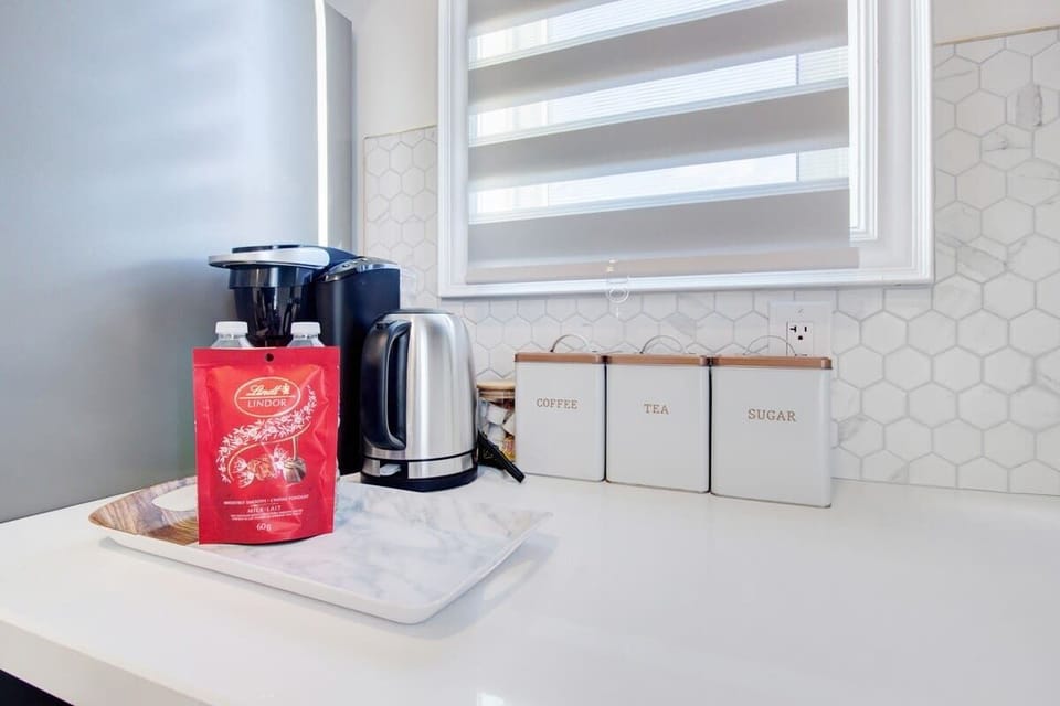 Start your morning right with fresh coffee from your private kitchen.