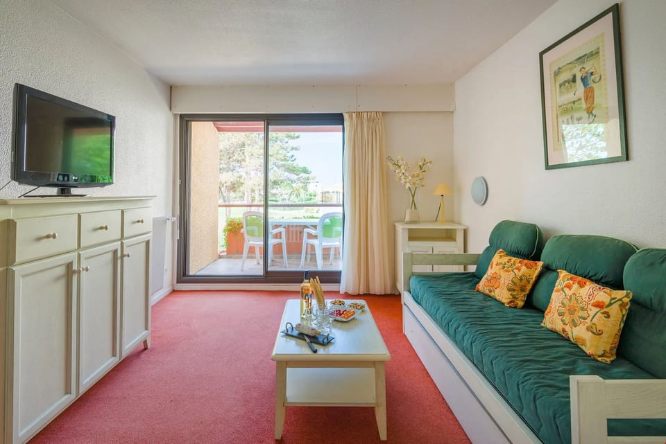 Kick back your feet and relax in the cozy living area.