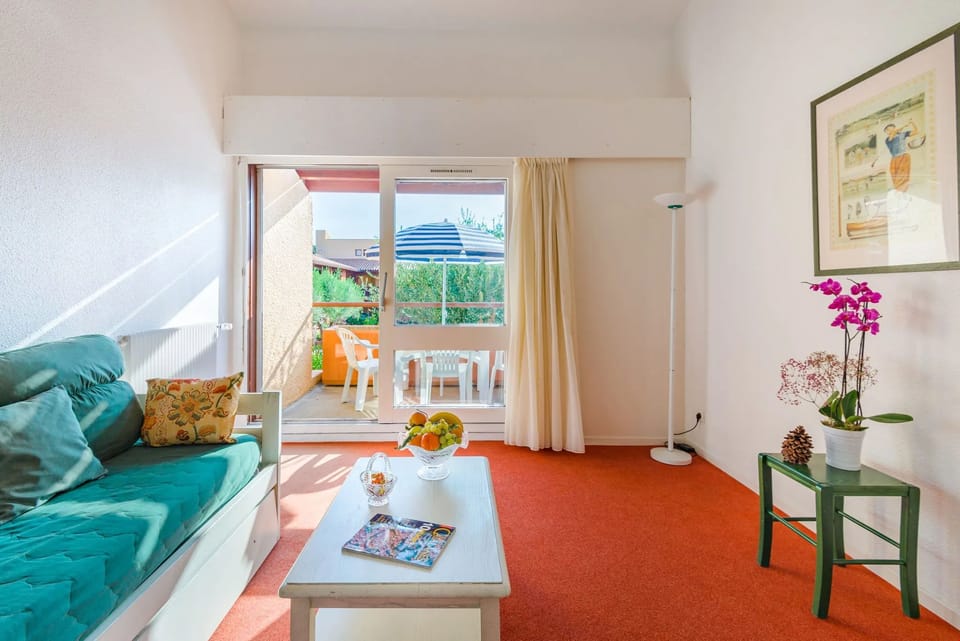 Kick back your feet and relax in the cosy living area.