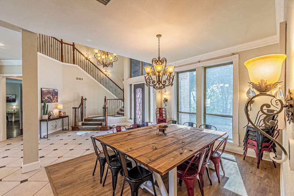 Dining table can fit 16 guests or be separated into 2 tables of 12 guests each to sit 24
