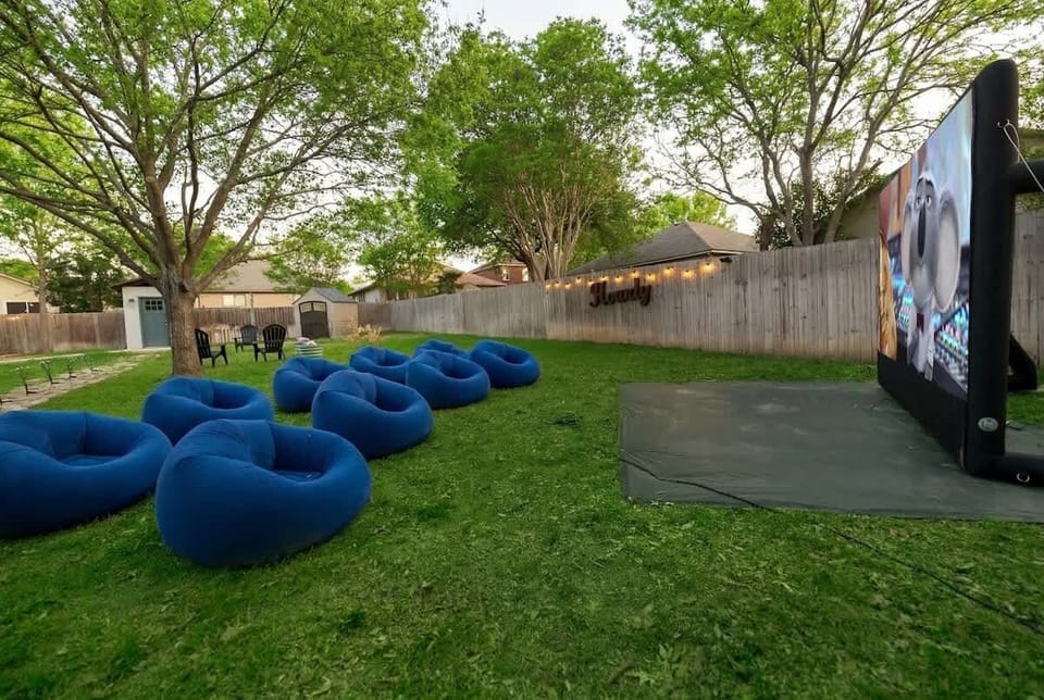 Backyard cinema awaits. Plush seating ready. Grab popcorn, press play, relax.