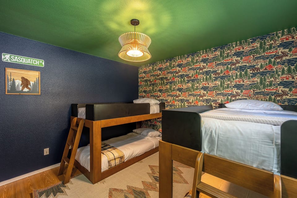 Fun bunk room with cabin-inspired decor and space for the whole crew