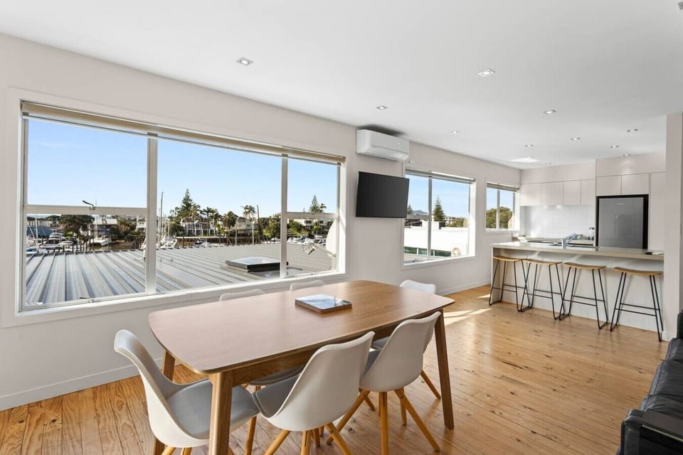 Open plan living, dining and kitchen with Marina Views