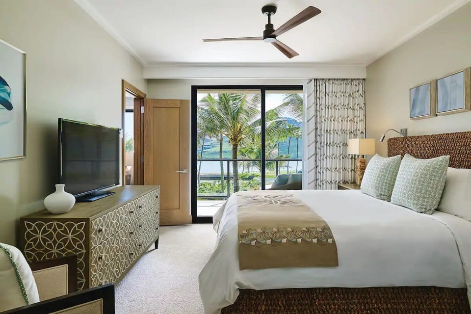 Premium bedding, desk, laptop workspace, soundproofing