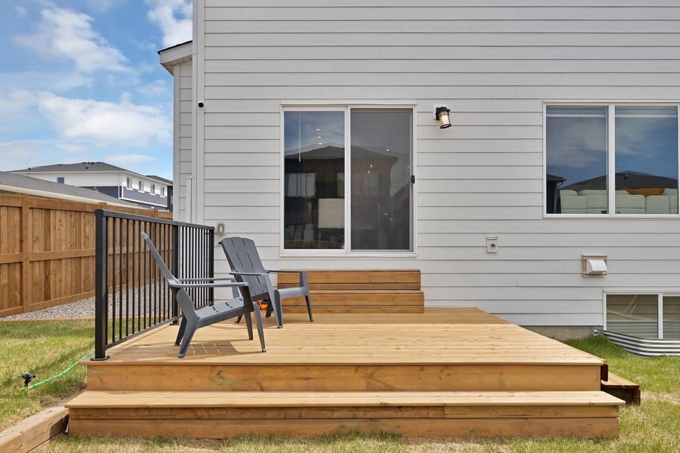 Private backyard deck with seating and easy indoor-outdoor access
