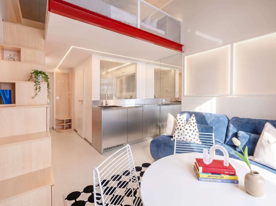 The living room and kitchen equipped with everything you need for basic cooking