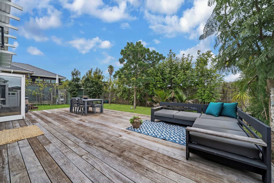 Back Garden with outdoor Dining and Large umbrella