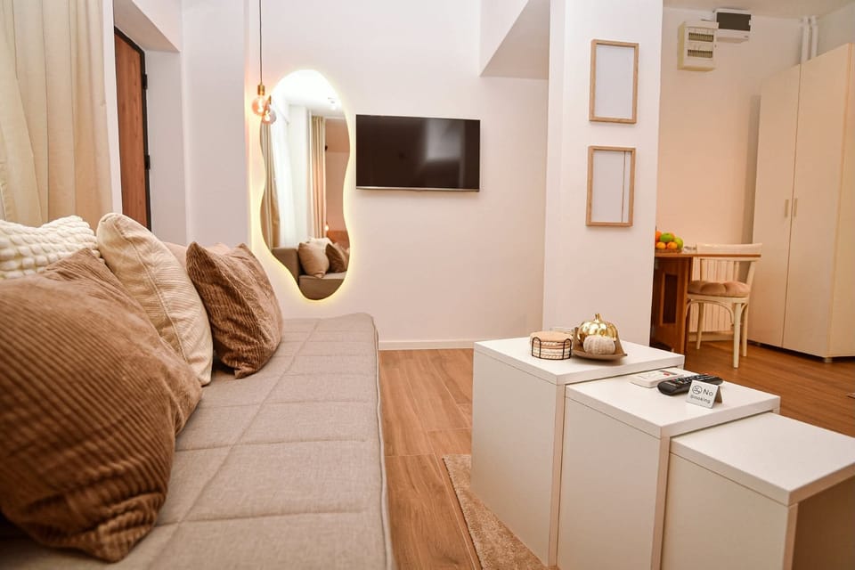 interior, indoor, couch, living area, television, desk