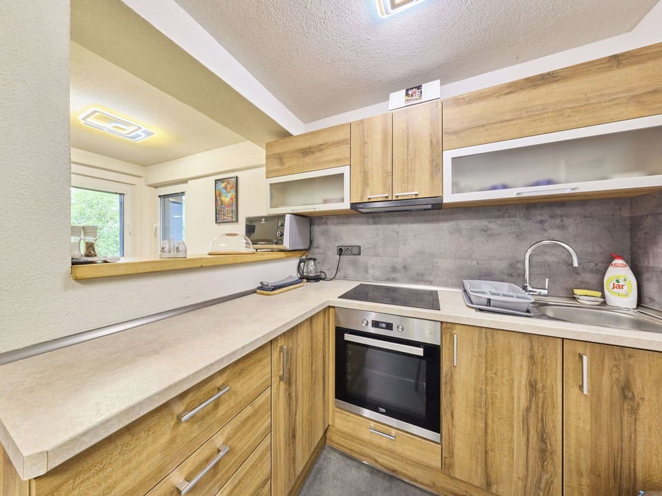 Countertop, Wood, Flooring, Kitchen, Cabinetry, Interior Design, Major Appliance, Sink, Furniture, Floor