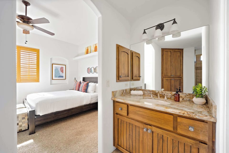 Enjoy the convenience of this vanity en-suite leading to the bedroom.