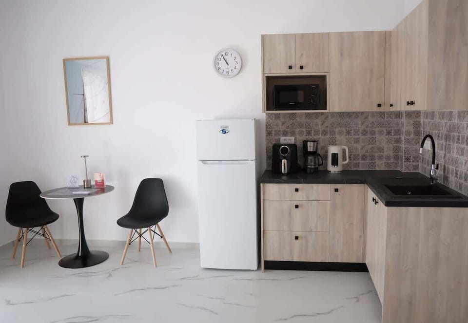Fully Equipped Kitchen and Dining Area for Home-Cooked Meals