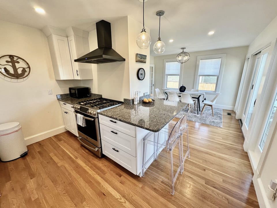 A gas stove and hood vent is perfect for preparing meals during your stay.