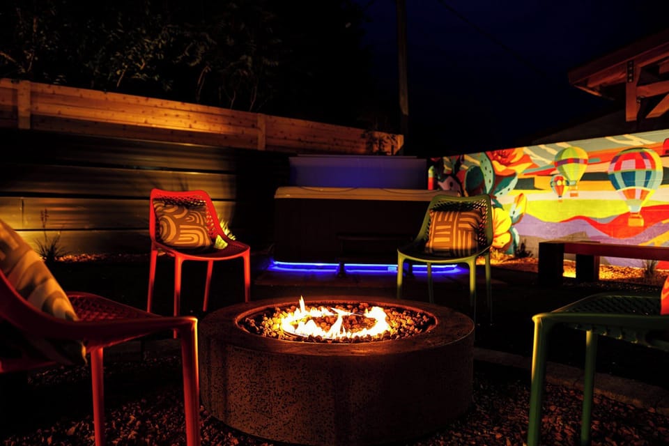 Cozy up around the fire pit or soak in the hot tub under the stars at the Bike Barn in Kanab, UT. Your perfect night awaits!