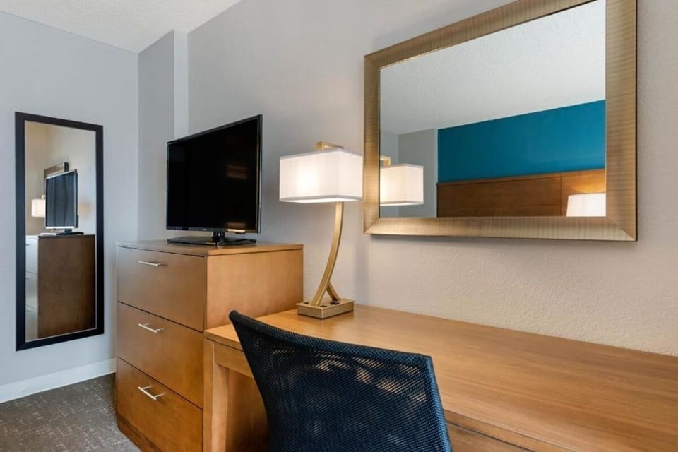 Recharge and plan tomorrow at the sleek, well-lit workspace.