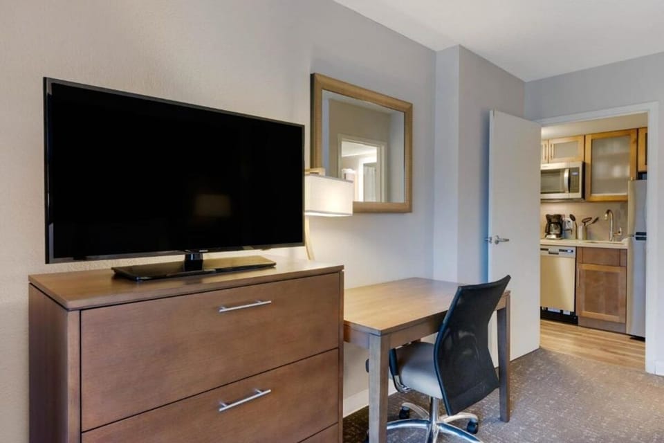 Settle in at the desk and enjoy easy in-room entertainment.