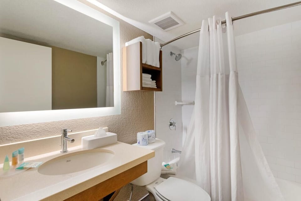 Refresh effortlessly in the bright bath with illuminated vanity mirror.