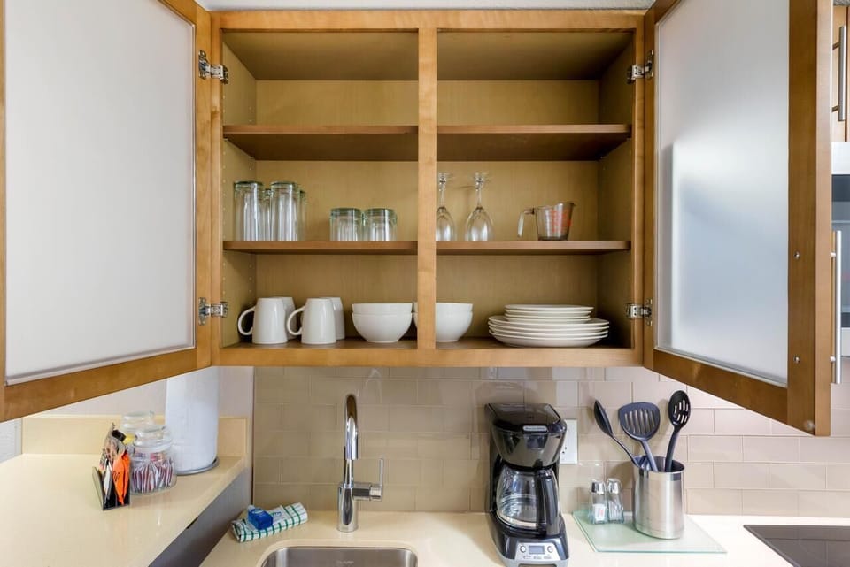 Start mornings right with coffee and stocked dishware nearby.