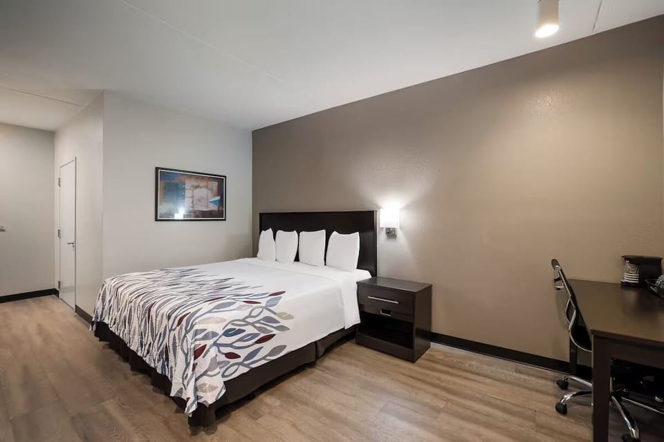 Unwind in a spacious king room with dedicated work desk.