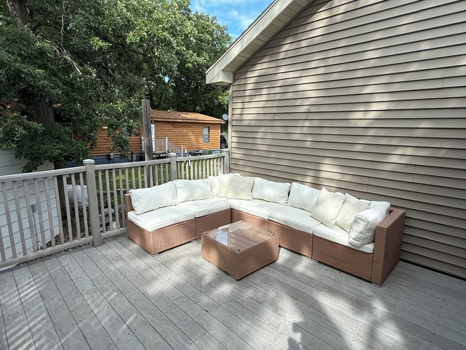 Deck with seating off dining room. Enjoy the lake view!!