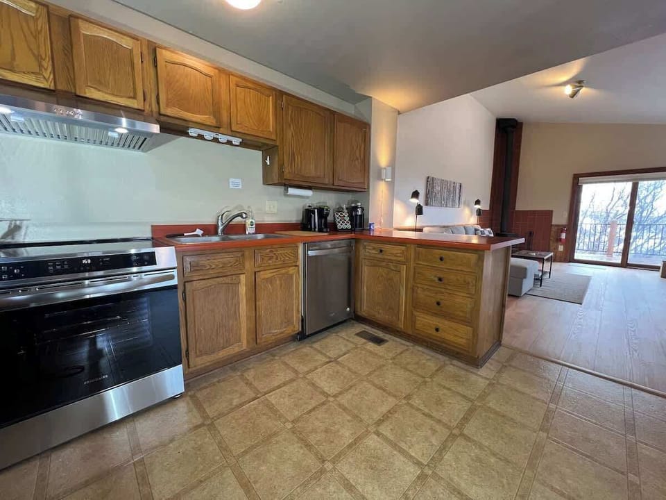 KItchen with new induction stovetop and convection/air fryer oven