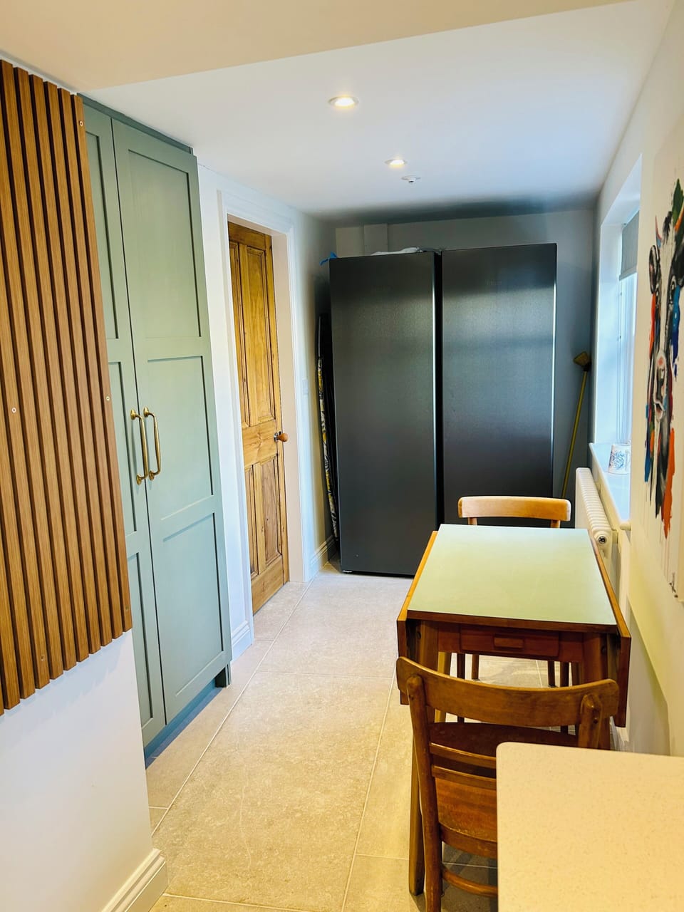 The Pantry Liebherr Fridge & Freezer, Larder on left and 60ies breakfast table. 