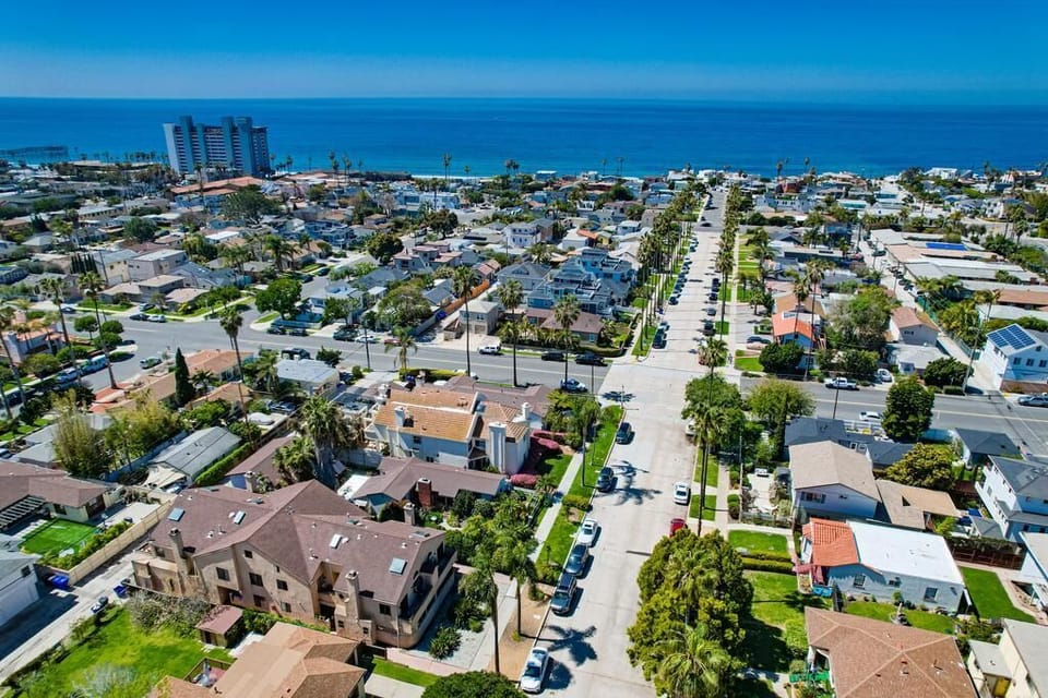 Ocean just 2 blocks straight down a palm tree lined street