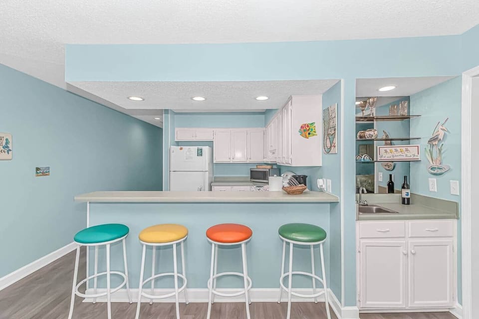 Convenient breakfast bar with seating for casual meals and snacks.